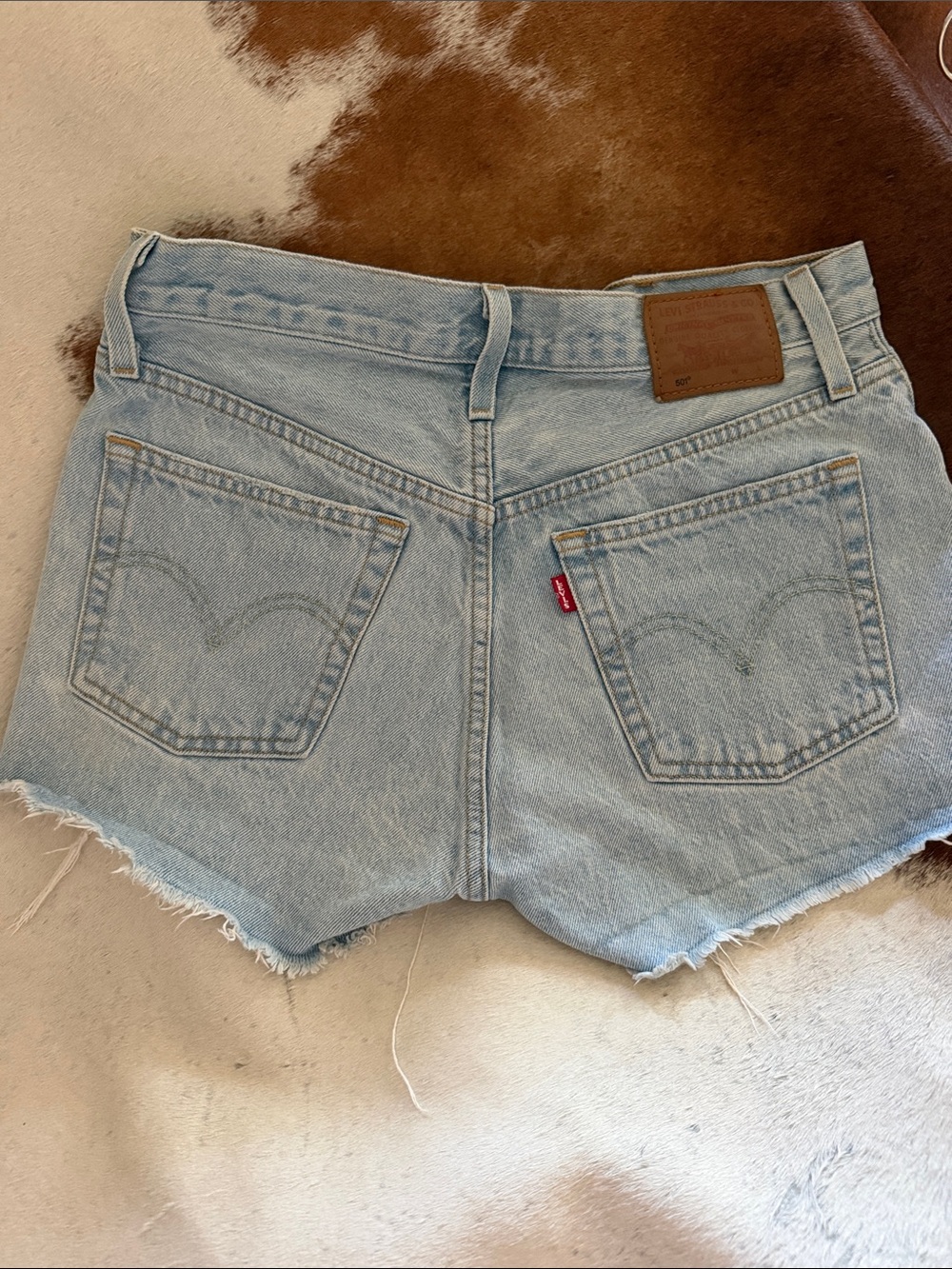 Levi's Light Blue Cutoff Denim Shorts with Frayed Hem